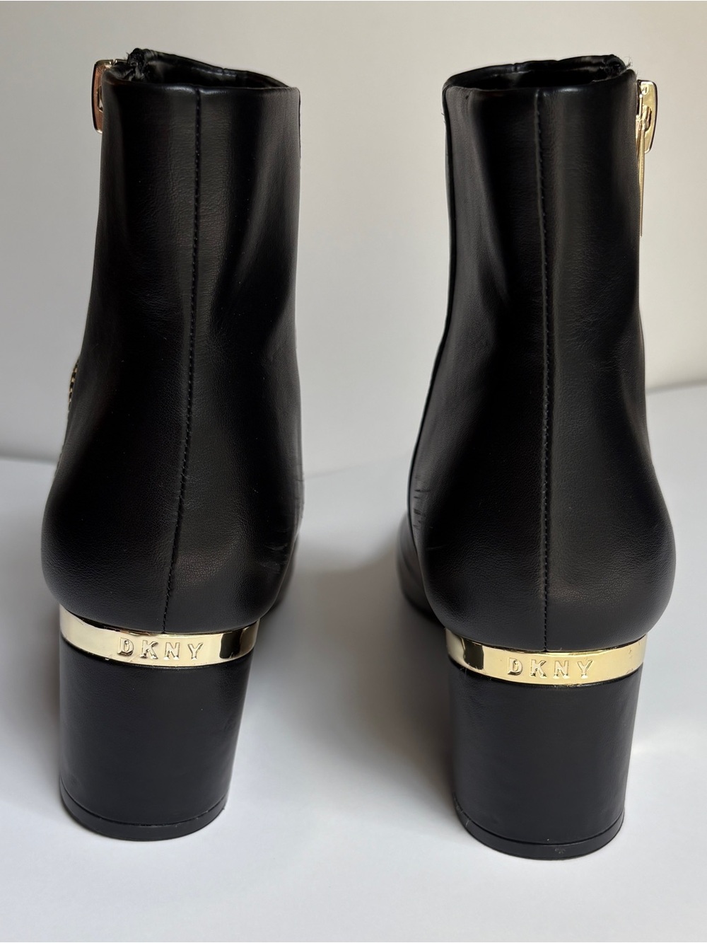DKNY Women's Black Leather Block Heel Ankle Boots with Gold Accen